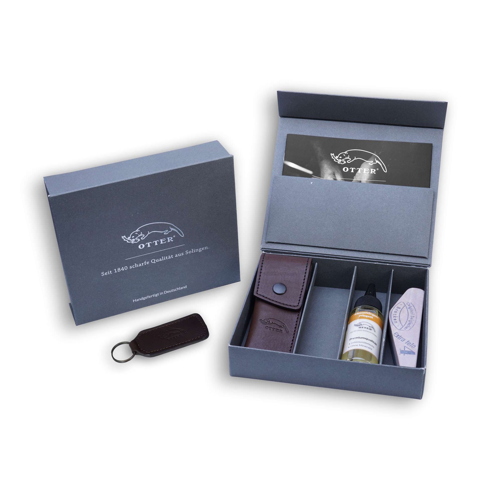 Geschenkbox: Messerholster 01 | Pflegeöl Klinge | Belgischer Brocken Nr. 4 | Schlüsselanhänger Geschenkbox: Messerholster 01 | Pflegeöl Klinge | Belgischer Brocken Nr. 4 | Schlüsselanhänger
