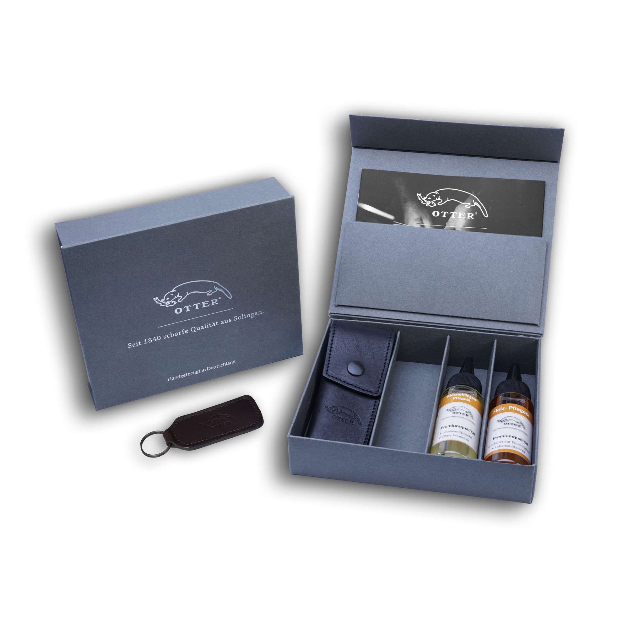 Geschenkbox mit Messerholster, Pflegeöle und Schlüsselanhänger.