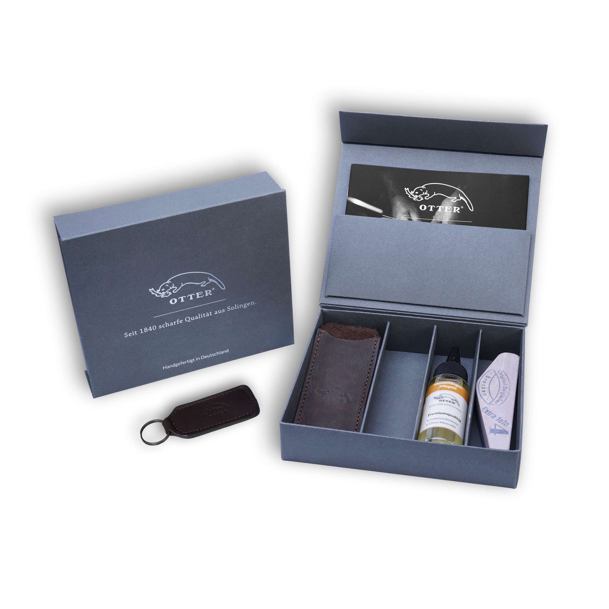 Geschenkbox: Lederetui 05 | Pflegeöl Klinge | Belgischer Brocken Nr. 4 | Schlüsselanhänger Geschenkbox: Lederetui 05 | Pflegeöl Klinge | Belgischer Brocken Nr. 4 | Schlüsselanhänger