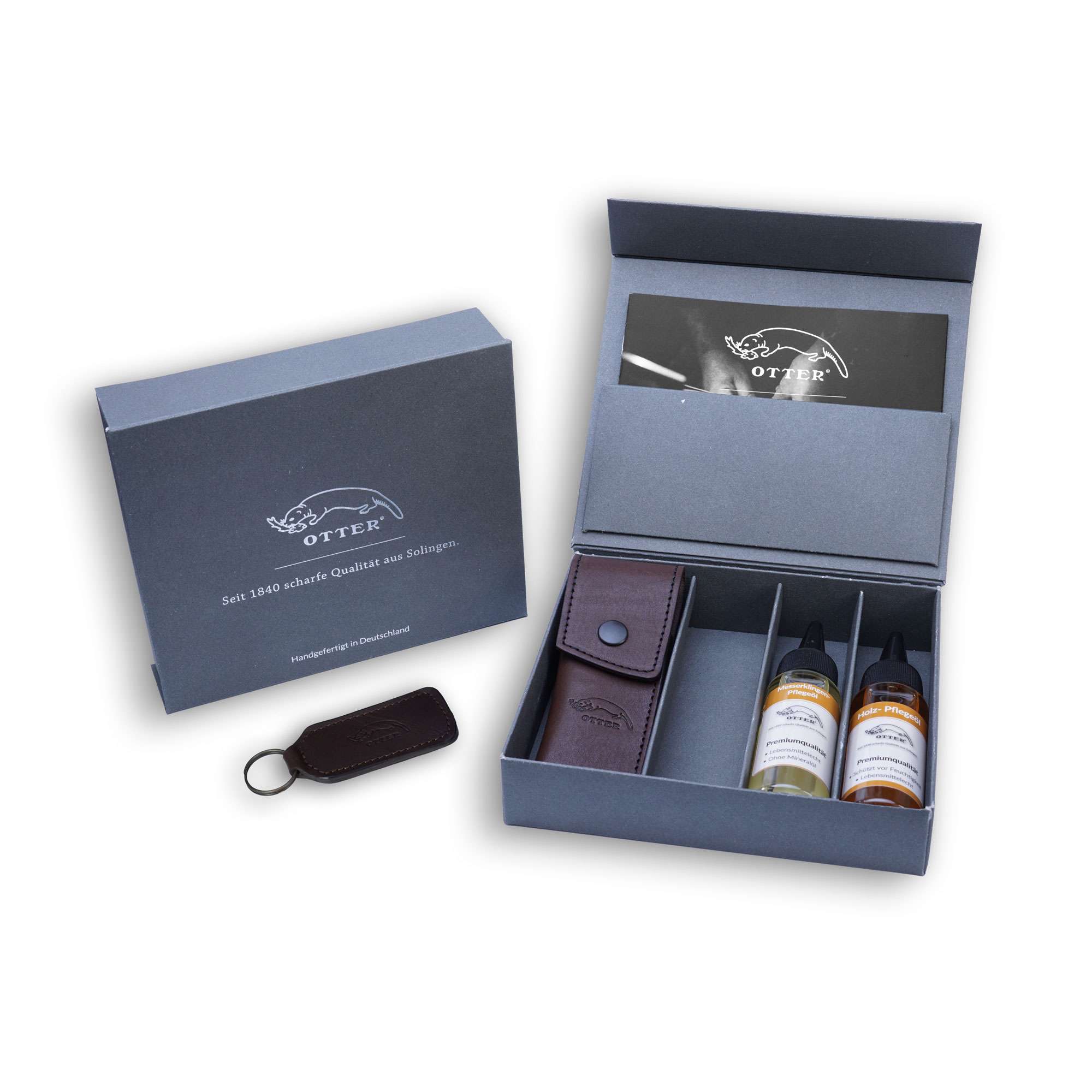 Geschenkbox mit Messerholster, Pflegeöle und Schlüsselanhänger. Geschenkbox mit Messerholster, Pflegeöle und Schlüsselanhänger.